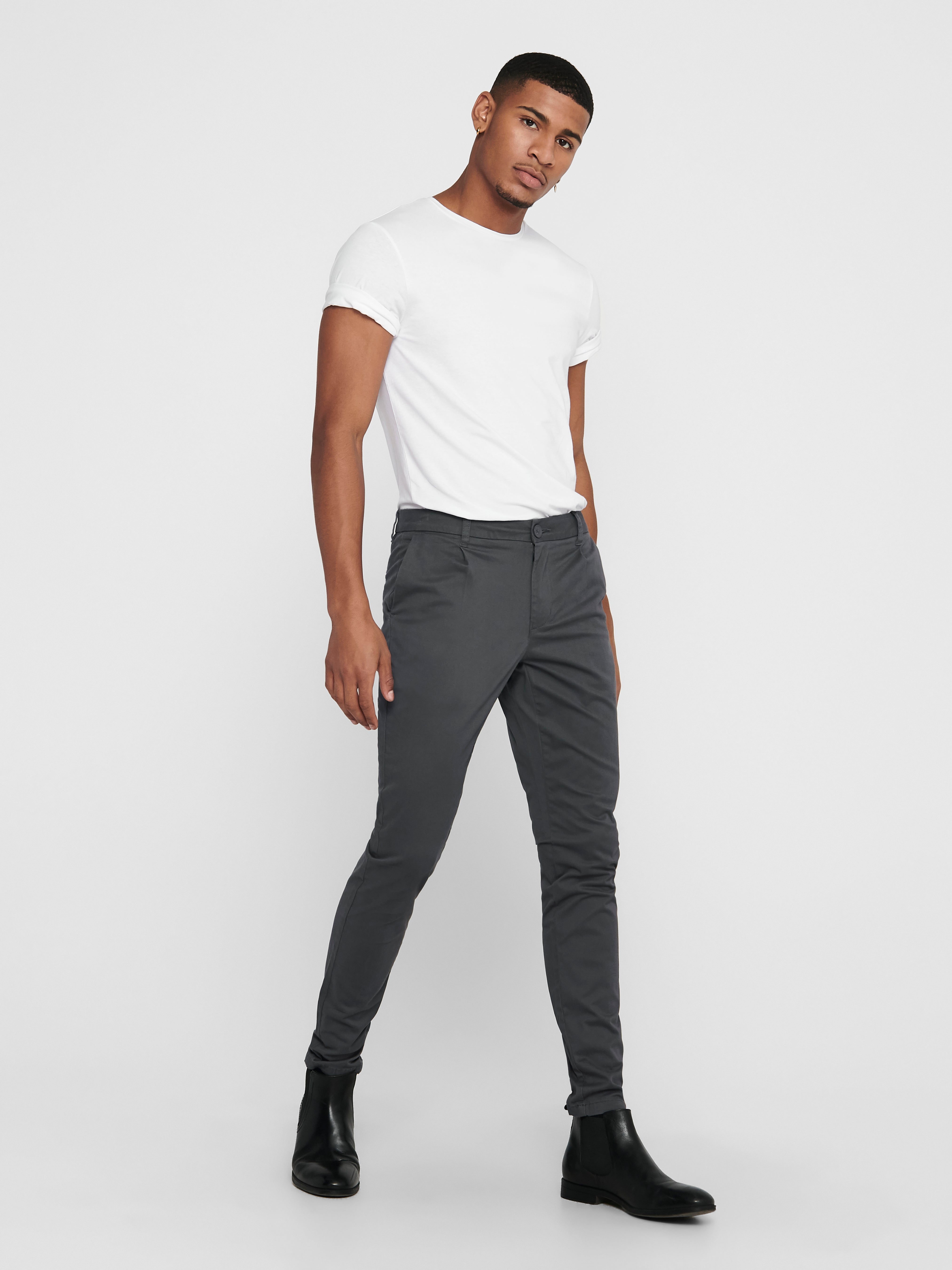 ASOS DESIGN tapered trousers with ankle tab detail | ASOS