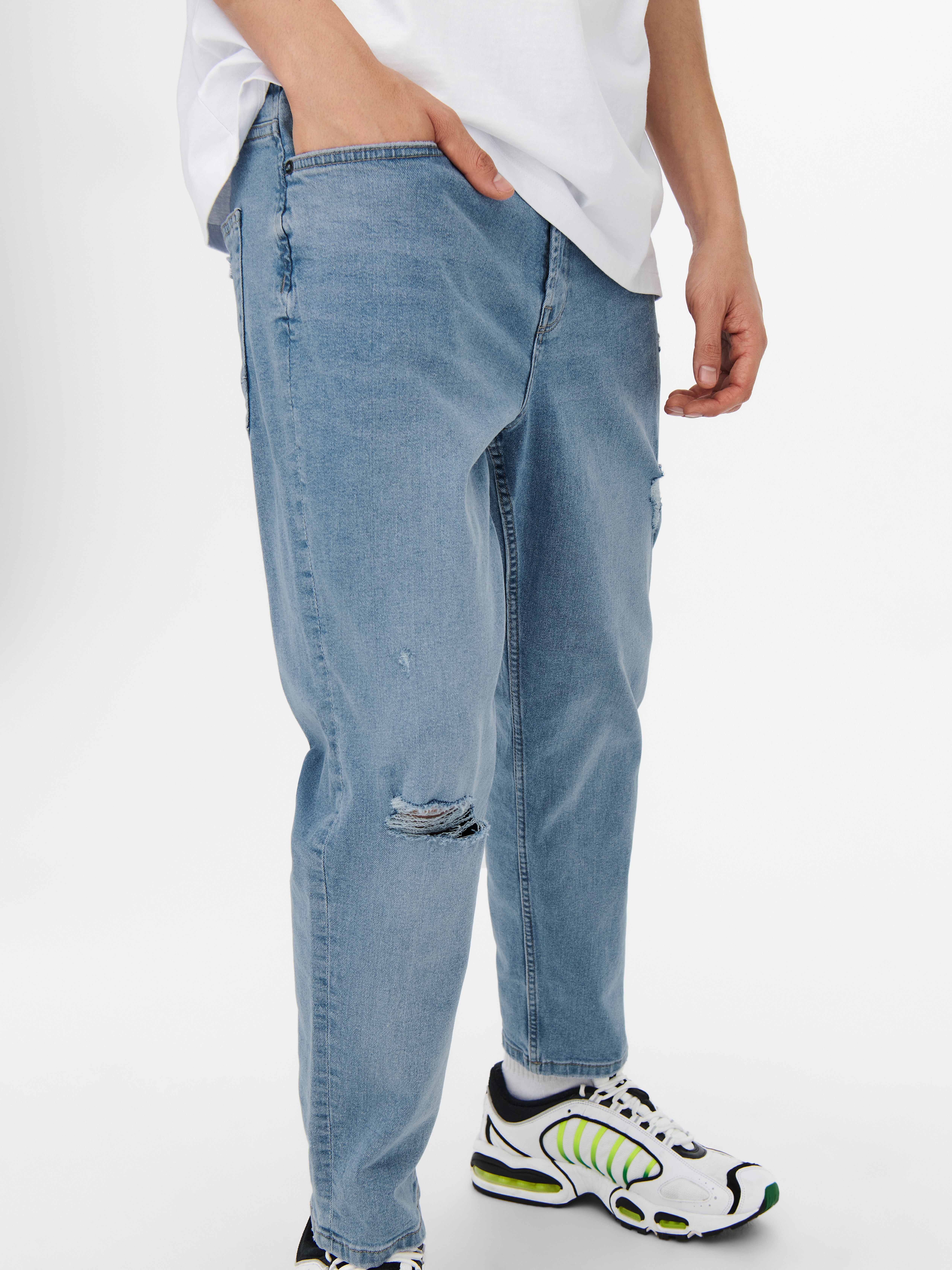 Tapered carrot cheap jeans