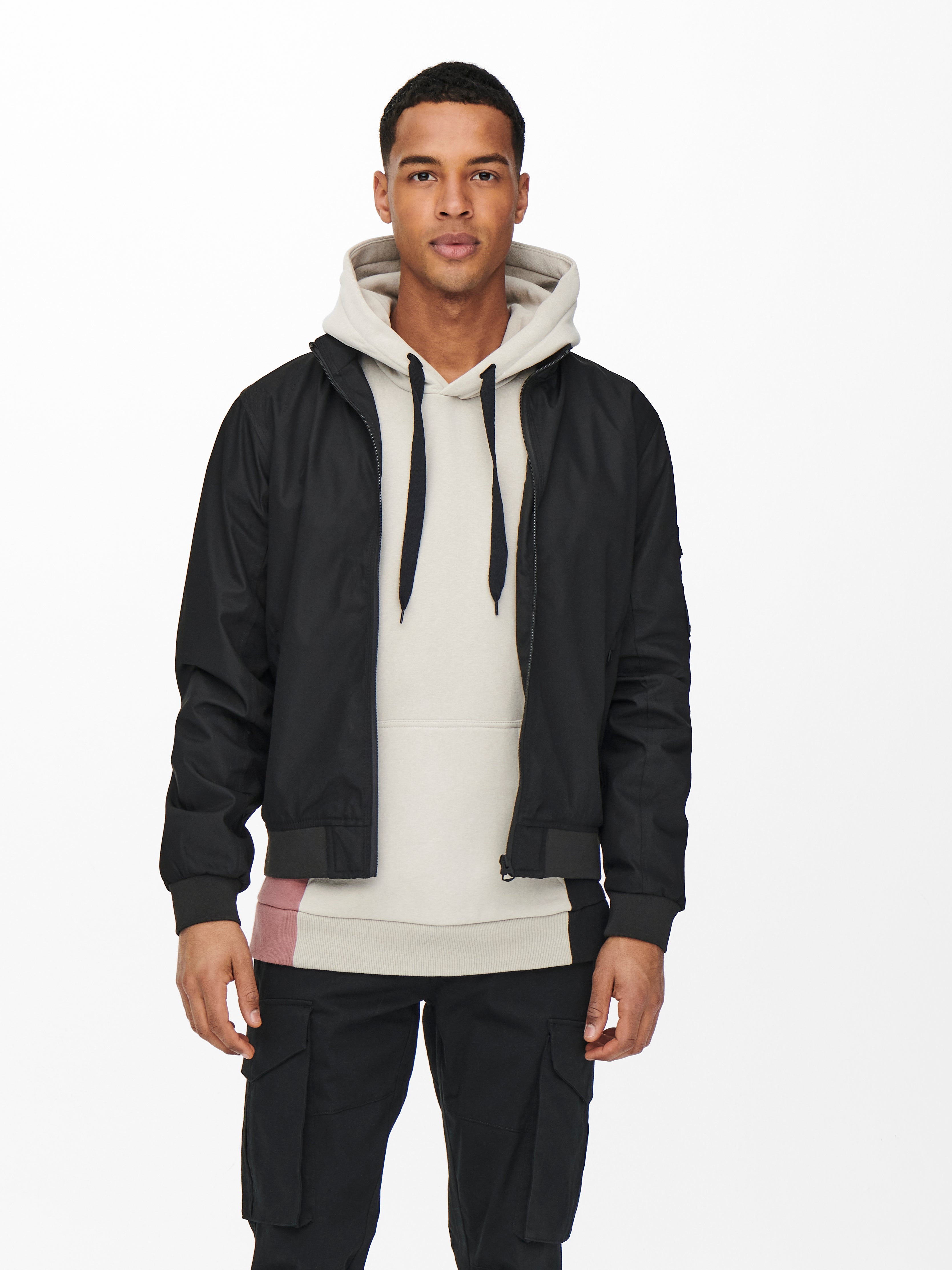 black bomber jacket and hoodie